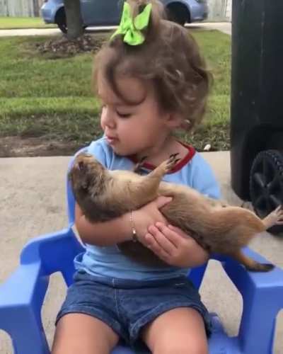 Just a gal singing to her prairie dog ?