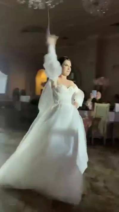 Hold my beer while I dance with a sword at my own wedding.