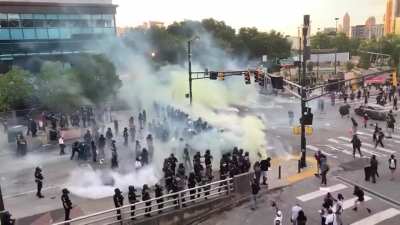 Atlanta police fire tear gas at protesters, wind blows it back in their direction