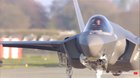 Fighter plane receives a foam salute instead of a water salute
