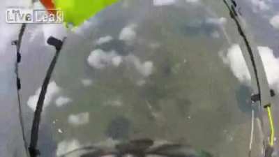 Man catches shoe in mid-air while parachuting