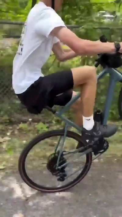 Bro is showing a bike trick
