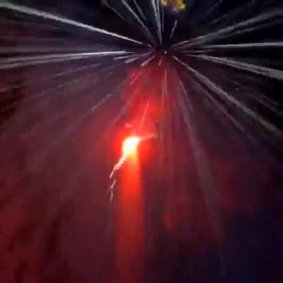 Wingsuit in a snowstorm at night
