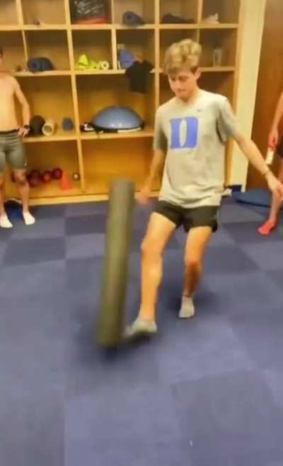 Kicking a foam roller