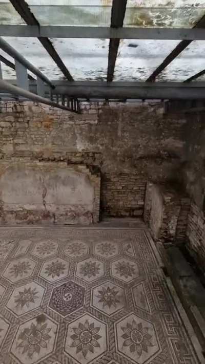 One of the best Roman Mosaics in Croatia is hidden away between a side street &amp; parking lot in Pula. It was "discovered" by Allied Bombs in WW2. (More places like this on my YT chan @Tattooed Traveler)