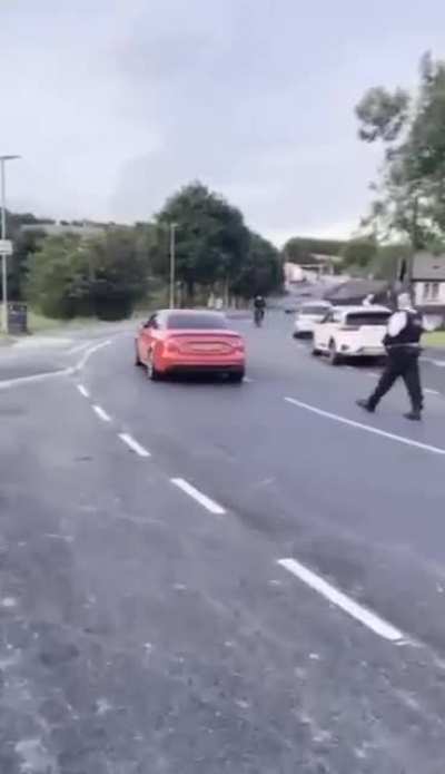 Man with a petrol engine fitted to a bicycle vs the police