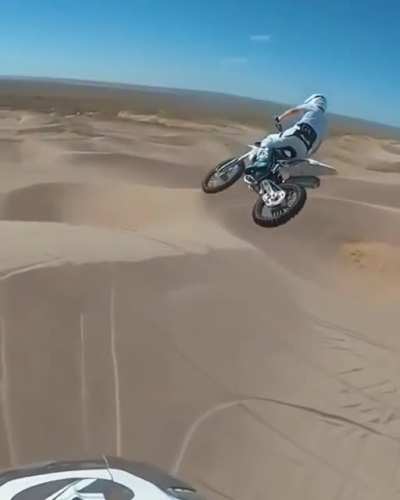 The rider filming this with a GoPro is equally insane