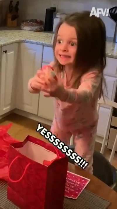Kid gets kinderjoy for christmas (not OC)