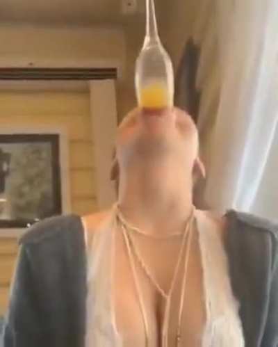 To gulp down a drink without using hands