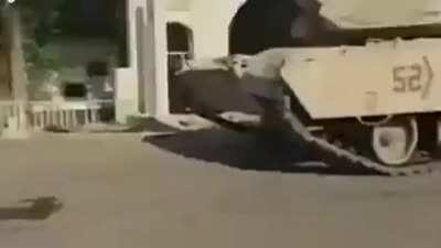 U.S tankers crushing a taxi driver's car/livelyhood for "stealing wood".