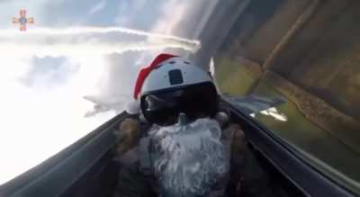 Ukrainian jet pilot in Santa costume firing missiles at Russian targets