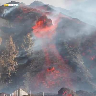 Spains Geological and Mining Institute released this footage of a huge molten Boulder sliding down Cumbre Vieja Volcano yesterday