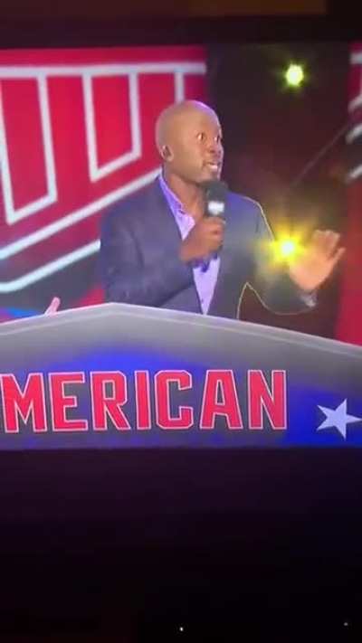 Ninja Warrior contestant in a 3 piece suit