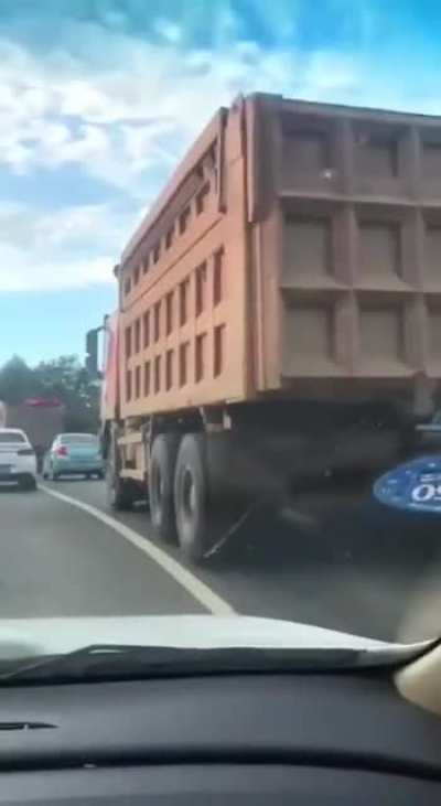 Not being aware of the blind spots of a truck
