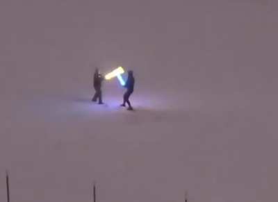 I tried to edit the brothers playing with lightsabers to look real