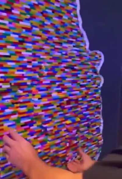 This Lego wall with hidden compartments