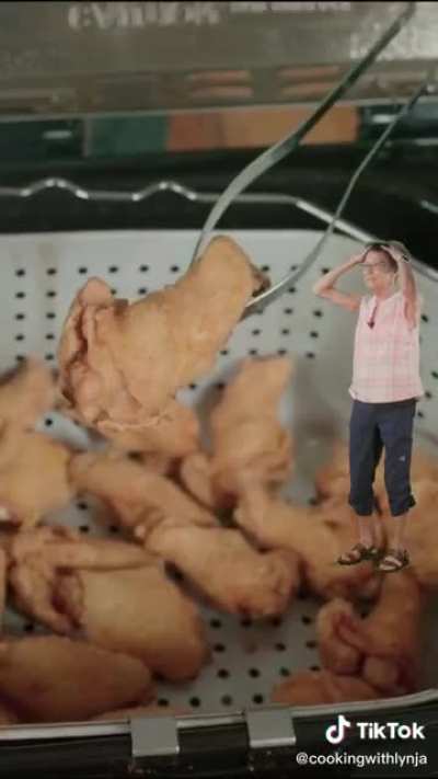 Grandma Lynja getting lit with Chicken Wings