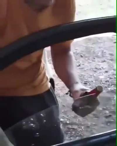 Using your car window to open a bottle