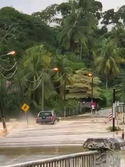 To cross a flooded road
