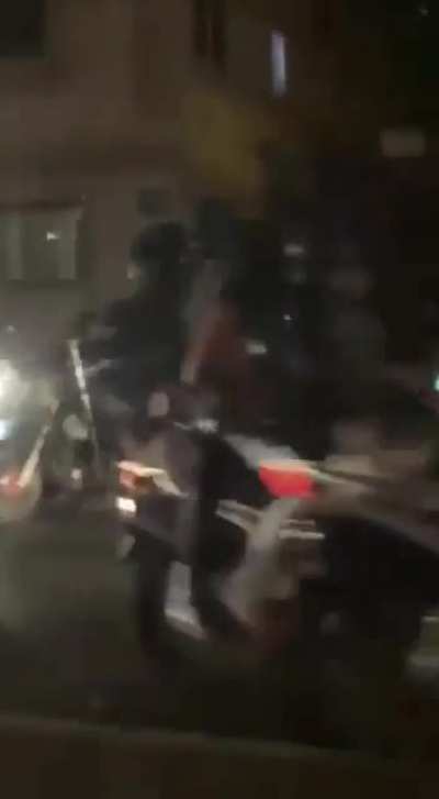 A woman filming the Iranian forces attacking college students is shot herself