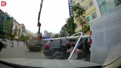 Lightpost lands on man's head.