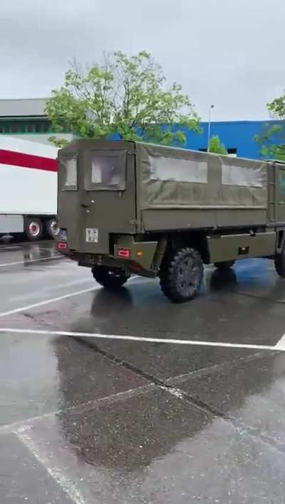 Swiss military pulling up. The laughing is what gets me??