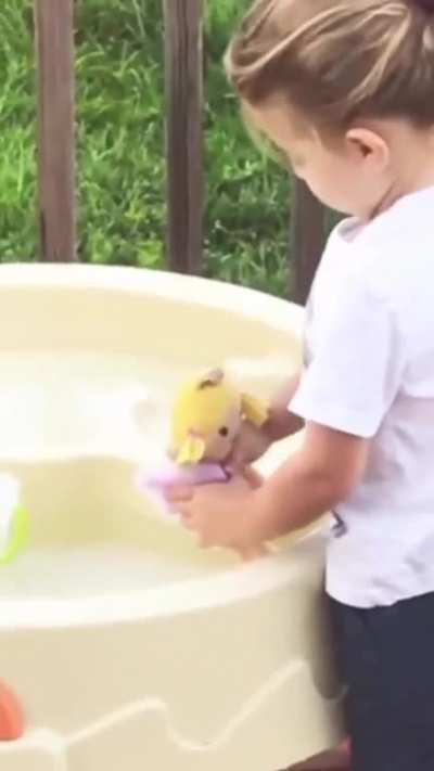 This Girl Playing With Her Doll