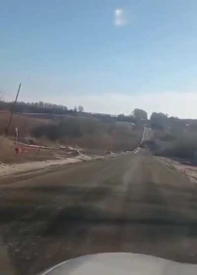 Russian tank runs out of Fuel, gets stuck on Highway. Driver offers to take the soldiers back to russia. Everyone laughs. Driver tells them that Ukraine is winning, russian forces are surrendering and implies they should surrender aswell.