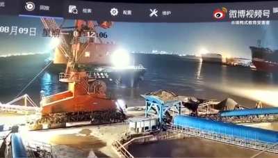 Unloading platform sinks after ship collides with it. China, 9 August 2021