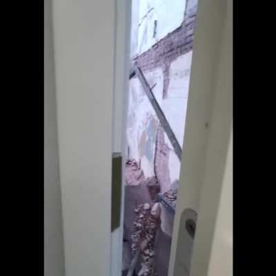 What could be behind the door in the office?