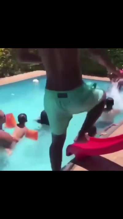 WCGW jumping into a pool wearing spiderman suit