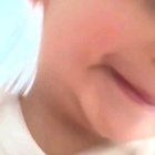A baby with a phone