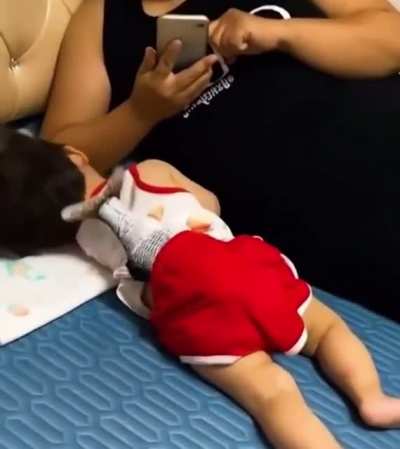 Baby being put to sleep with a flopping salmon. That’s it.