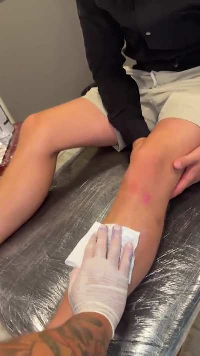 Getting a tattoo