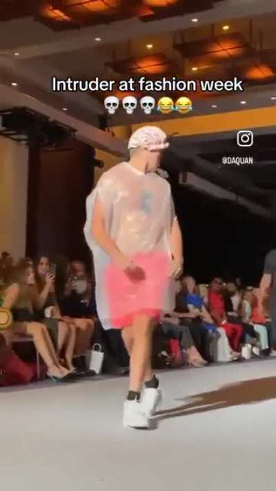 Dude snuck into a fashion show wearing a trash bag