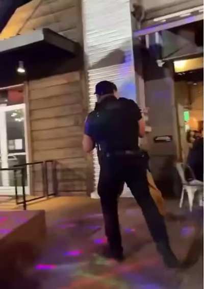 Security picks man up like he is a little kid