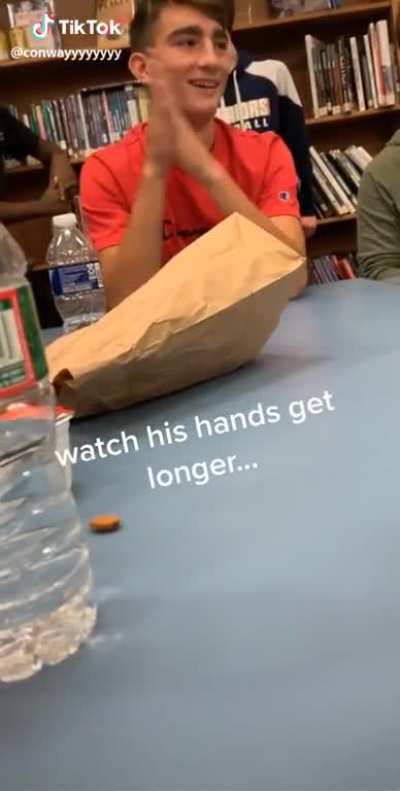 Watch his hands get longer...