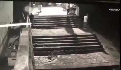 Just outside on the steps having a nice quiet piss ...