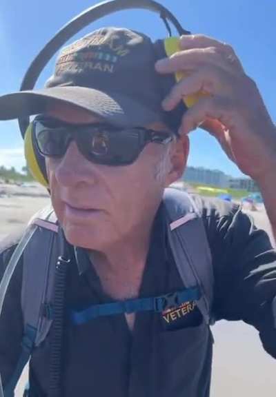 Metal detecting on the beach