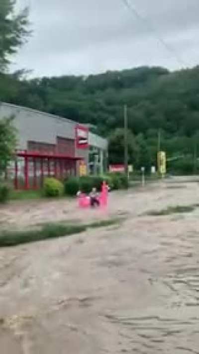 German guy enjoys the flood today in hagen.