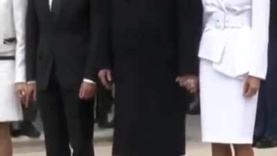 to hold hands and appear in love