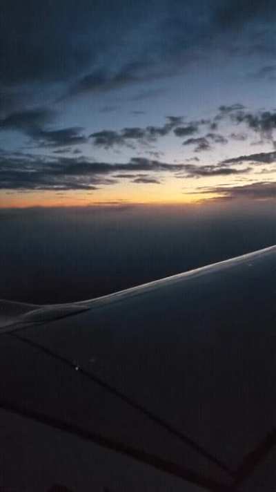 Descending from sunrise into fog.