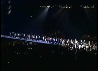 Fans piling up to get slapped by Antonio Inoki