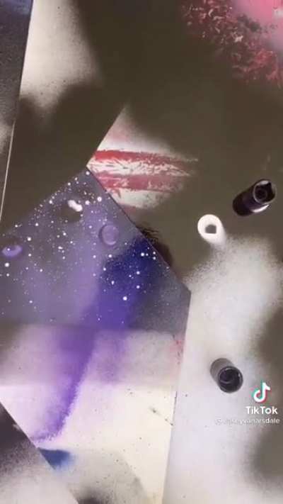 The spray paint Bob Ross