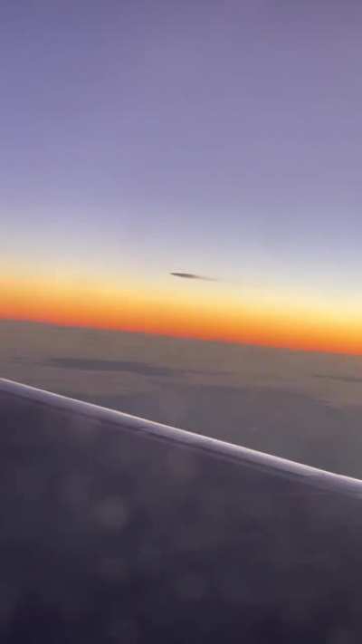 Spotted this plane (?) in the sky from my plane early this morning...