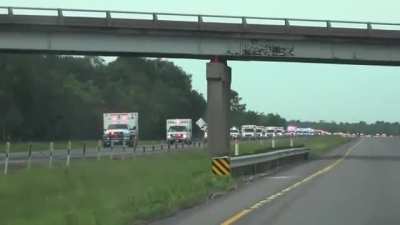 A massive convoy of Ambulances travelling toward Louisiana after Hurricane Laura made landfall