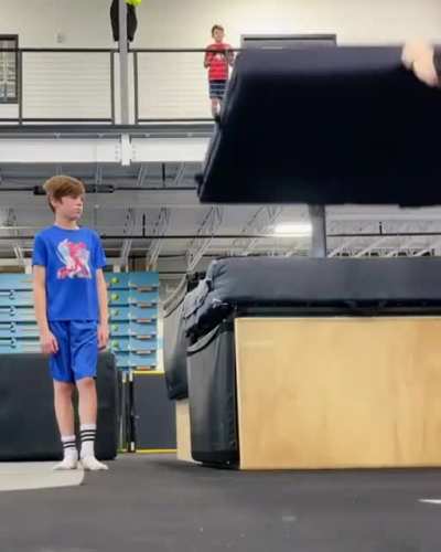 guy teaches kid how to do a backflip in just one hour