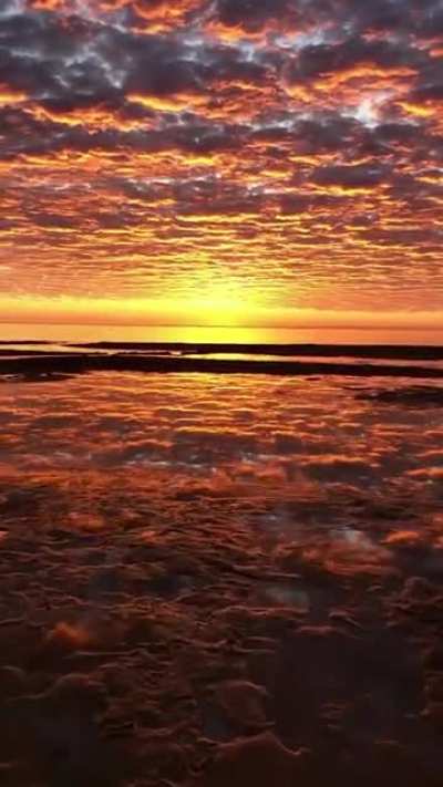 ? Water so still, feels like I'm walking on clouds