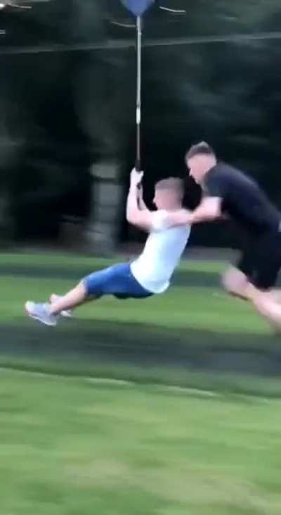 Man pushes friend on swing till he flips