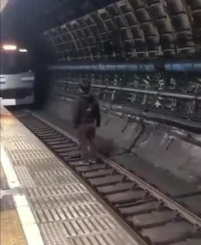 Man jumps in front of train